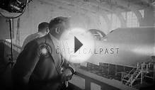 Workmen at Hughes Aircraft Company in California, busy in